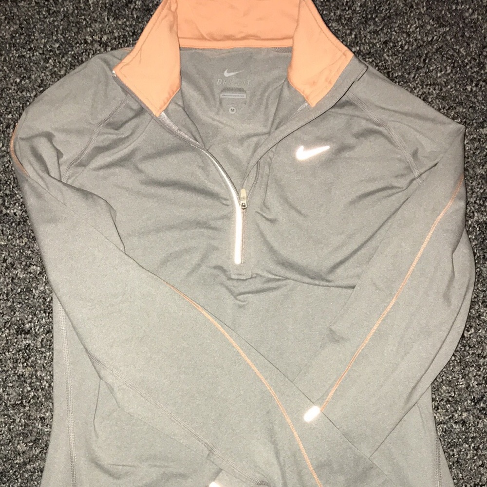 Nike Dri-Fit pullover, tight fitted